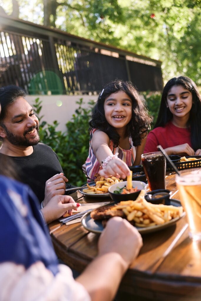 A family eating lunch at a pub